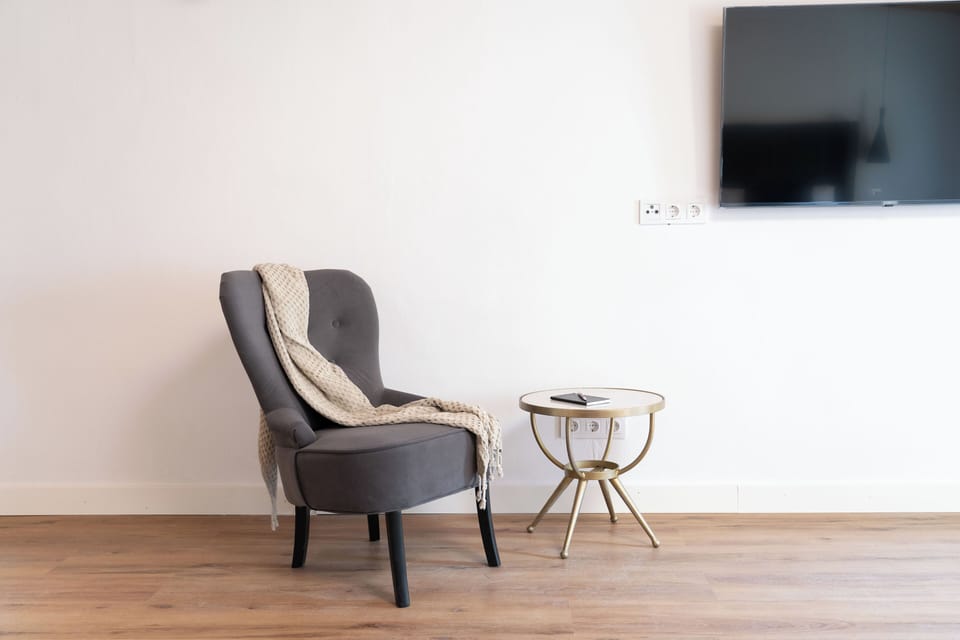 Deluxe Duplex, 1 Bedroom | 1 bedroom, in-room safe, blackout drapes, iron/ironing board