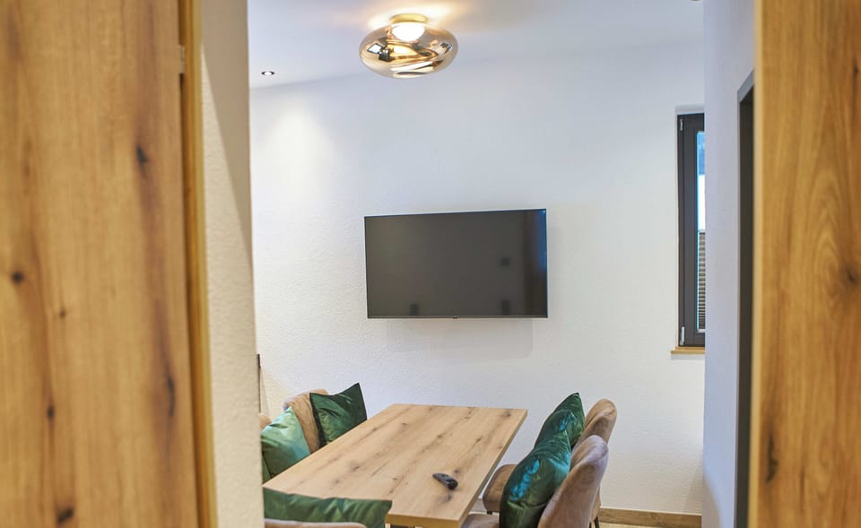 Comfort Apartment, 2 Bedrooms, Balcony, Mountain View | Living area | Flat-screen TV