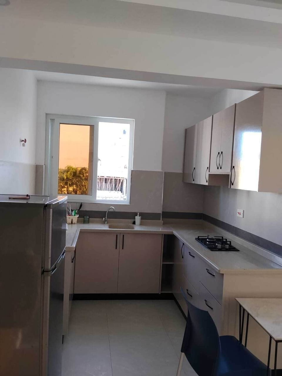 Fridge, microwave, stovetop, cookware/dishes/utensils