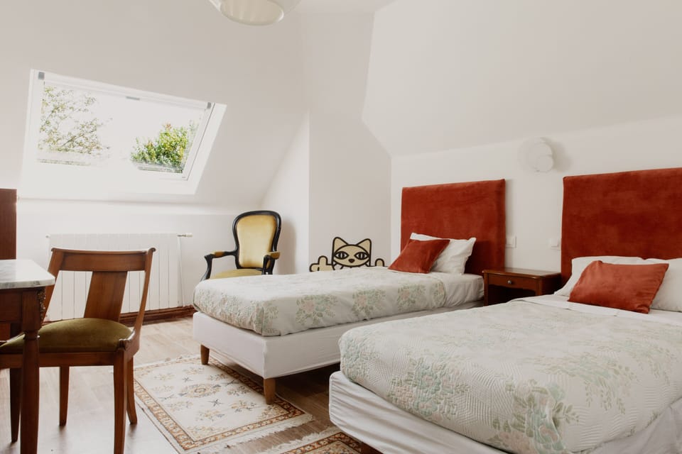 Family Suite, 2 Bedrooms, Garden View | Desk, laptop workspace, iron/ironing board, free WiFi