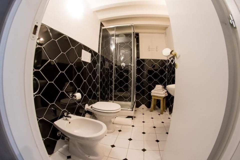 Basic Double Room, Balcony, City View | Bathroom | Hair dryer, bidet, towels, soap