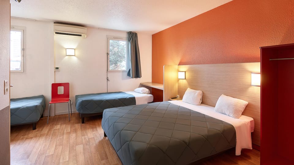 Standard Room, Multiple Beds | Desk, blackout drapes, soundproofing, free WiFi