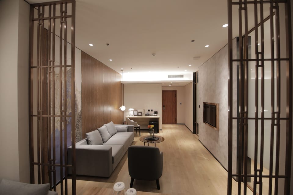 Suite | In-room safe, desk, laptop workspace, iron/ironing board
