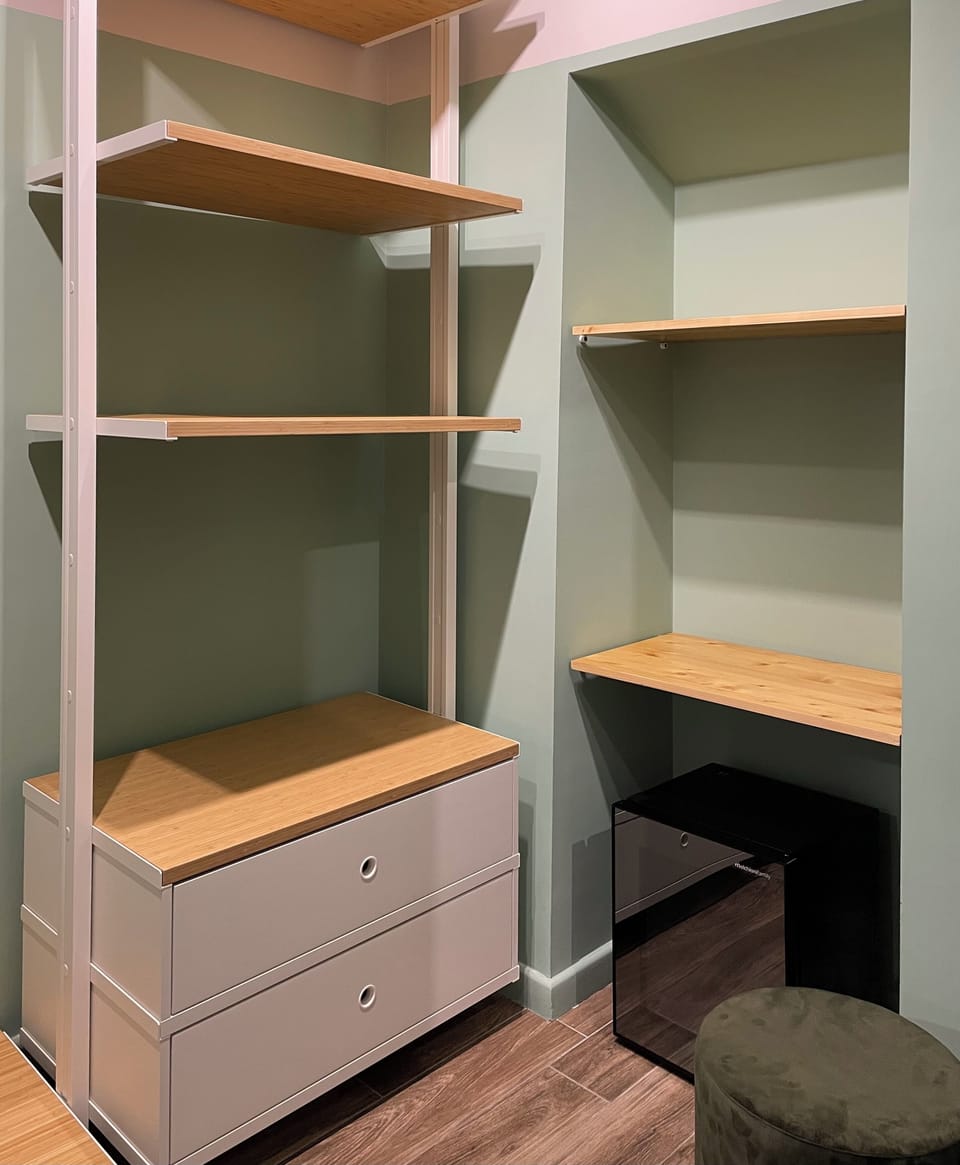 Deluxe Quadruple Room, Balcony | In-room safe, desk, laptop workspace, blackout drapes