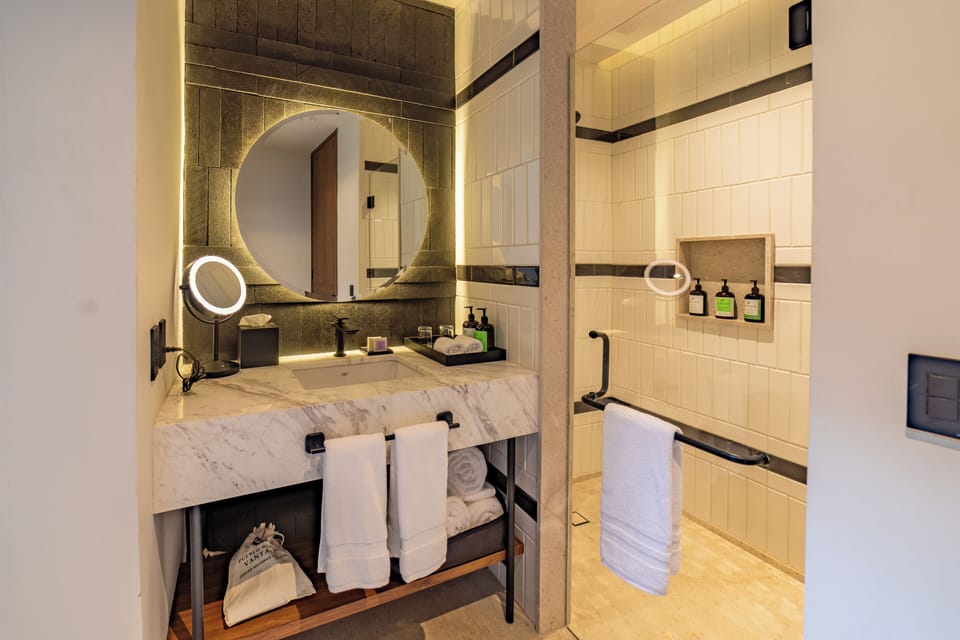 Shower, free toiletries, hair dryer, bathrobes