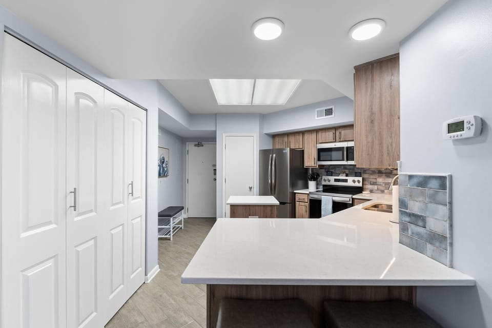 Condo, Multiple Beds (White Caps 804) | Private kitchen | Oven, toaster