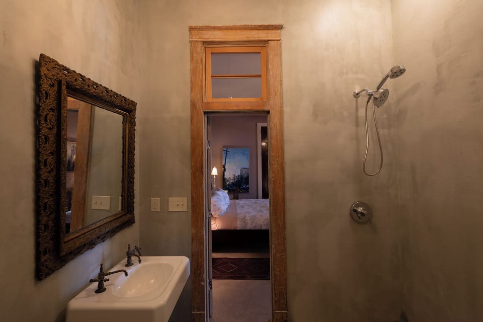 Superior Studio Suite, 1 King Bed, Garden Area | Bathroom | Separate tub and shower, towels, soap, shampoo