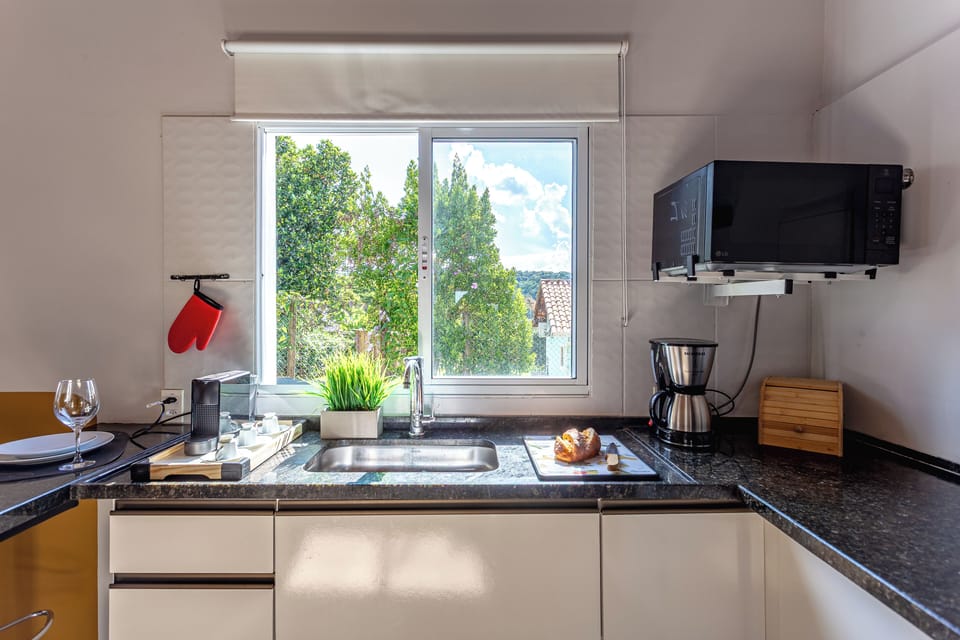 Villa | Private kitchen | Cookware/dishes/utensils, dining tables
