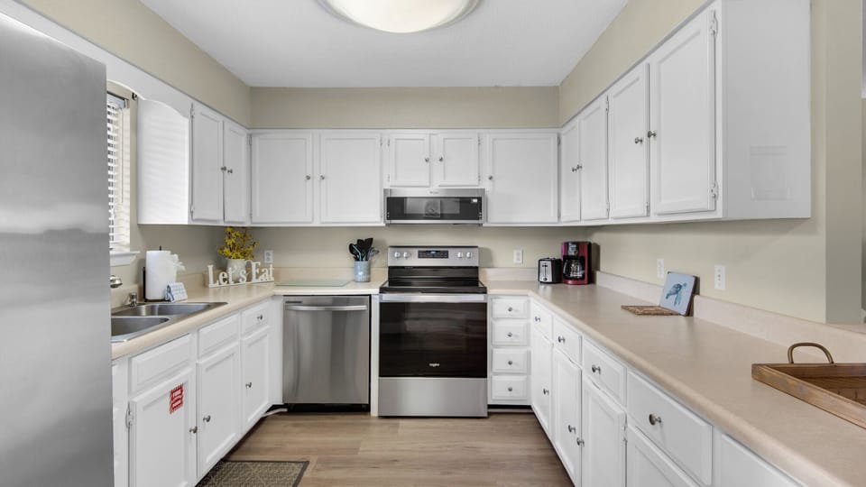 Condo, Multiple Beds, Patio, Garden View (Chateau La Mer II 902) | Private kitchen | Fridge, microwave, oven, stovetop