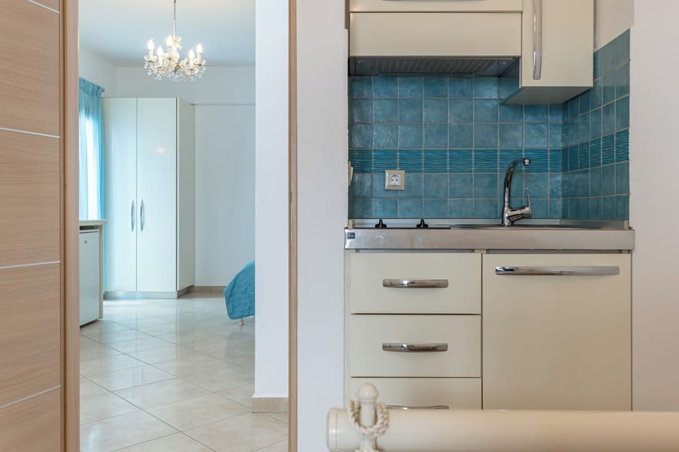 Deluxe Apartment | Private kitchen | Mini-fridge, stovetop, espresso maker, coffee/tea maker