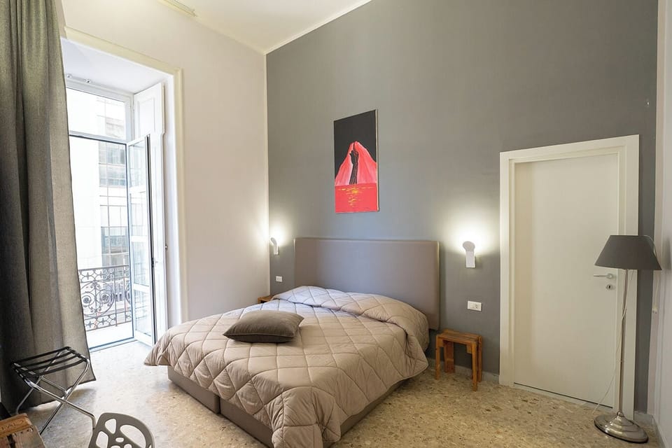 Deluxe Triple Room, City View, Annex Building (Pzza Bovio) | Desk, soundproofing, cribs/infant beds, free WiFi