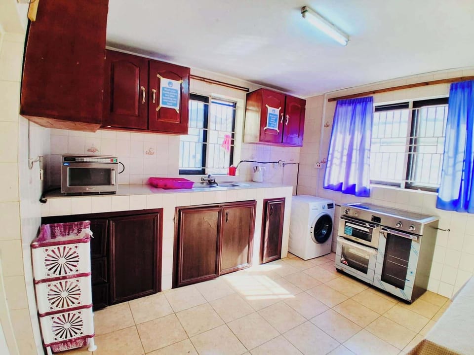 Mini-fridge, electric kettle, cookware/dishes/utensils