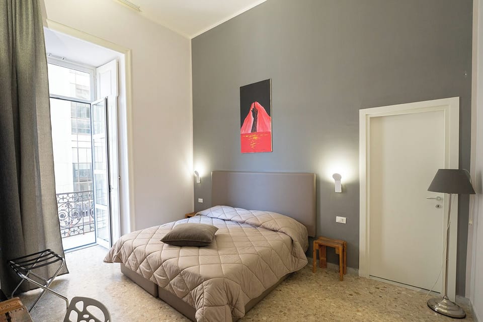 Deluxe Triple Room, City View, Annex Building (Pzza Bovio) | Desk, soundproofing, cribs/infant beds, free WiFi