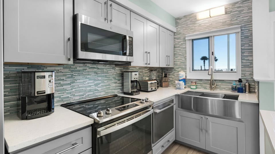 Condo, Multiple Beds, Patio, Partial Ocean View (Sand Cliffs 108) | Private kitchen | Fridge, microwave, oven, stovetop