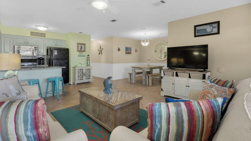 Condo, Multiple Beds, Patio, Garden View (Southwinds I-5) | Living area | 42-inch flat-screen TV with digital channels