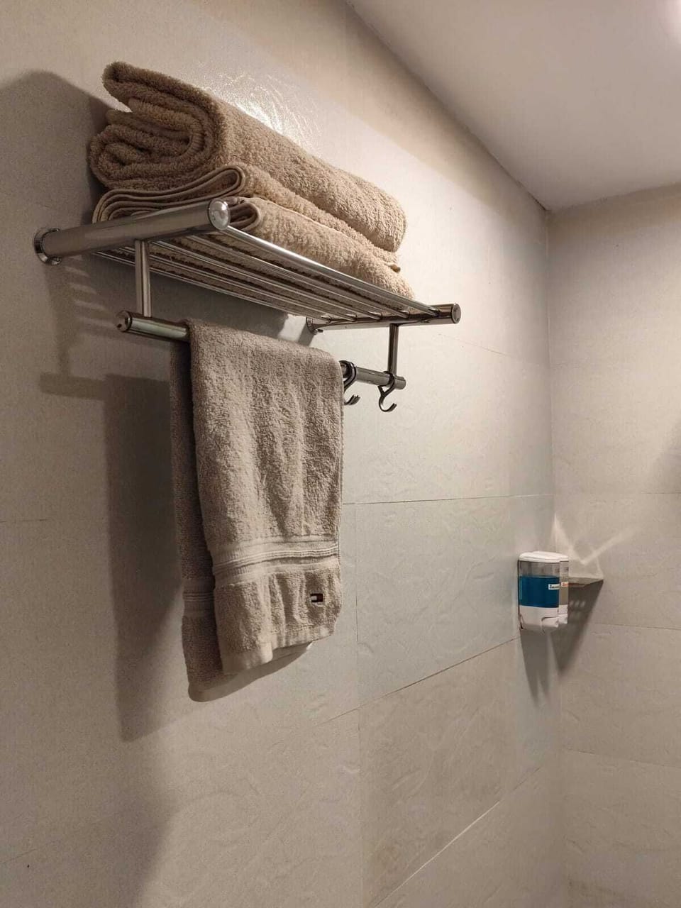 Shower, slippers, towels, soap