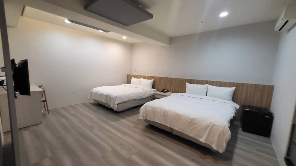 Basic Quadruple Room | Free WiFi, bed sheets