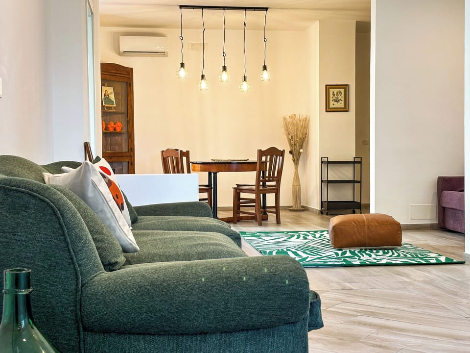 Apartment, Courtyard View | Living area | 60-inch Smart TV with digital channels