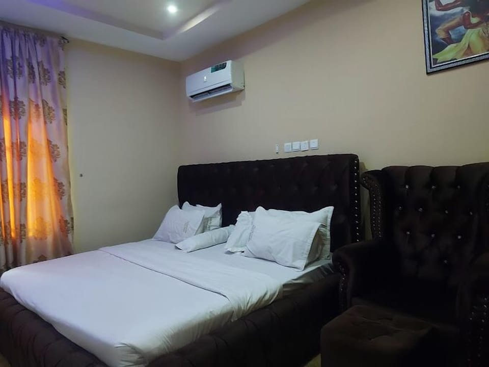 Deluxe Room, Balcony, City View | Desk, laptop workspace, blackout drapes, soundproofing