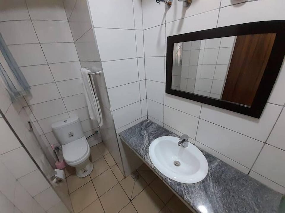 Family Room, Balcony, City View | Bathroom | Hair dryer, towels, soap, shampoo