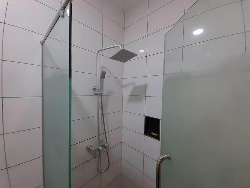 Family Room, Balcony, City View | Bathroom | Hair dryer, towels, soap, shampoo