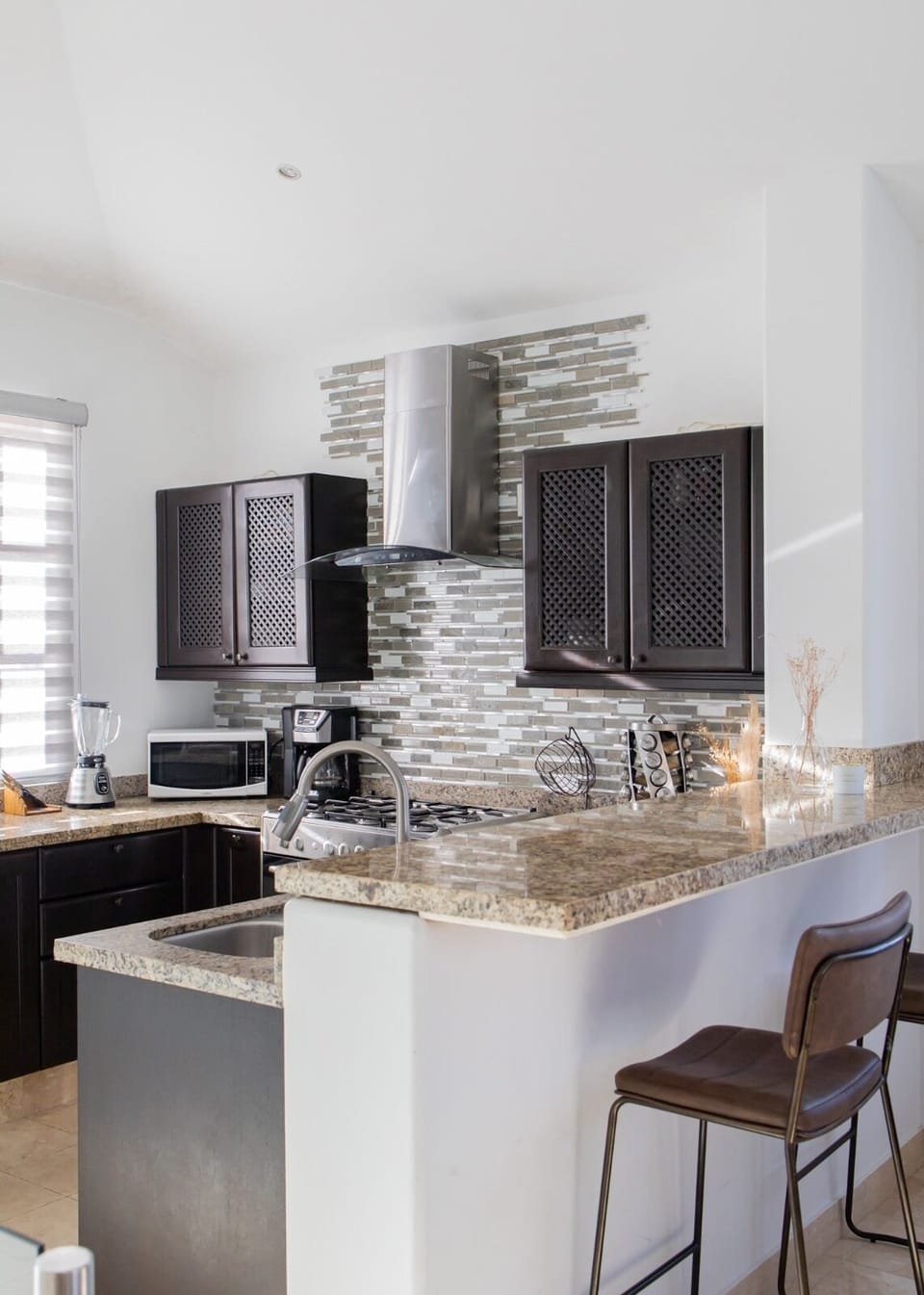 Premium Villa, Partial Ocean View | Private kitchen | Coffee/tea maker, highchair, dining table