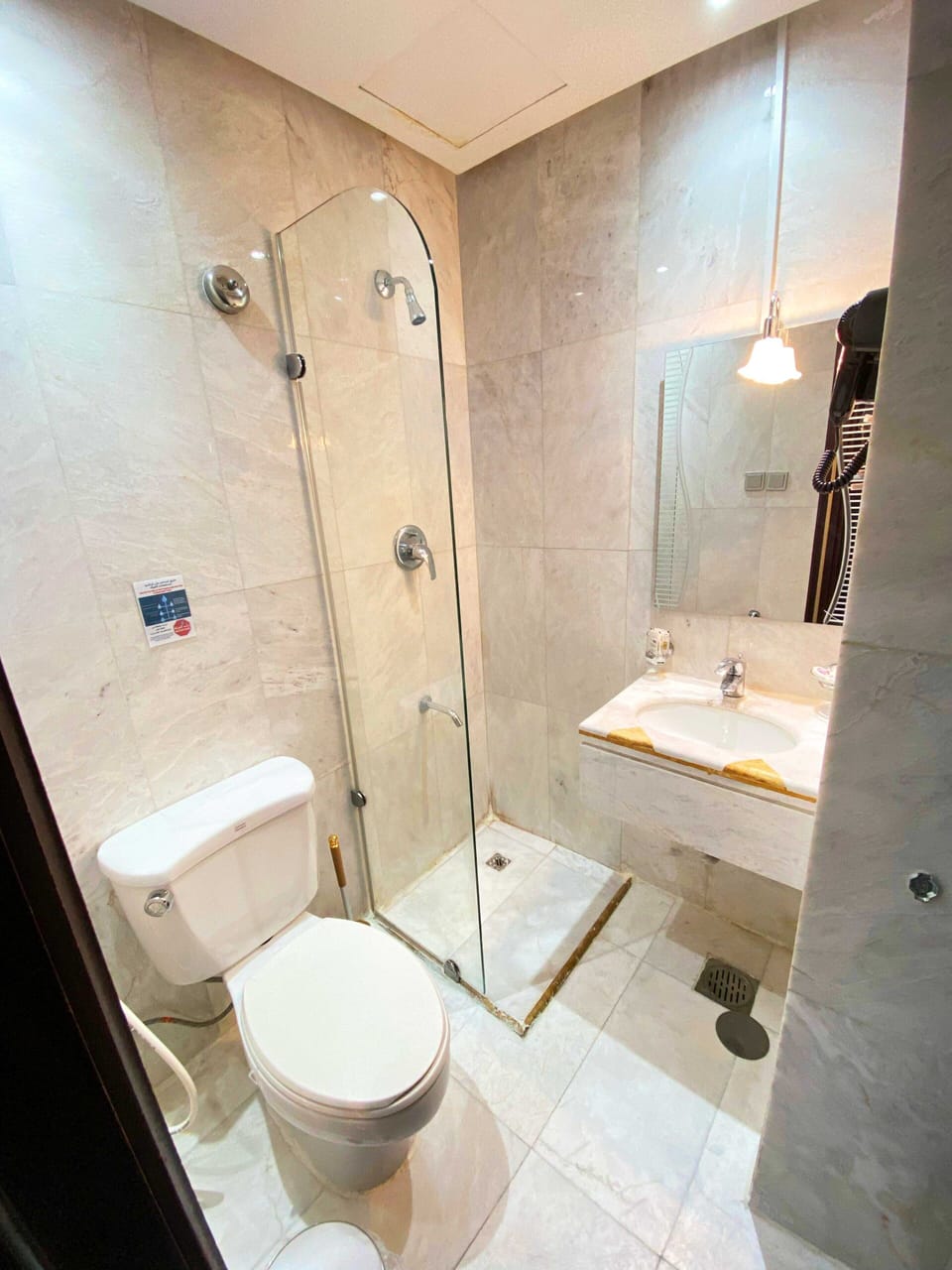 Separate tub and shower, hair dryer, towels, soap