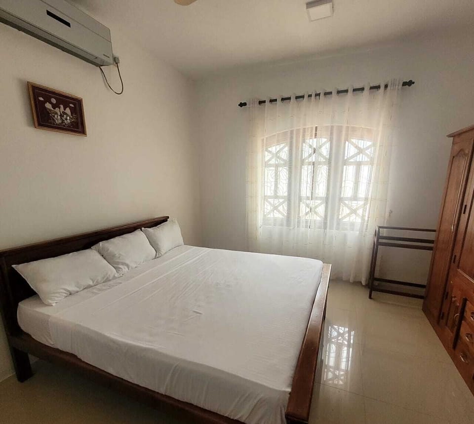 Comfort Apartment | Desk, laptop workspace, blackout drapes, iron/ironing board