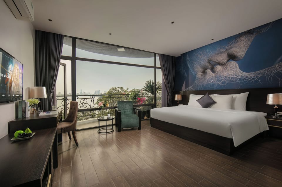 Executive Suite, Lake View | Minibar, desk, laptop workspace, soundproofing