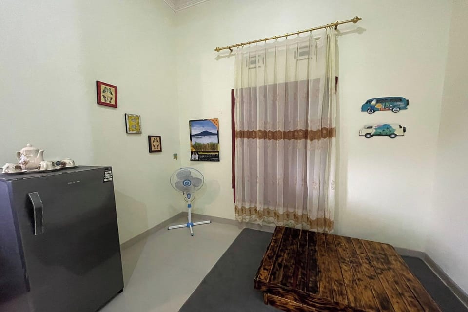 Villa | Private kitchen | Fridge, coffee/tea maker