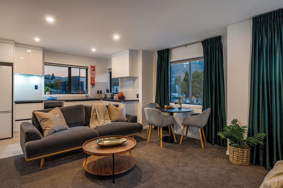Luxury Suite, 1 Bedroom, Mountain View | Living area | 43-inch Smart TV with cable channels