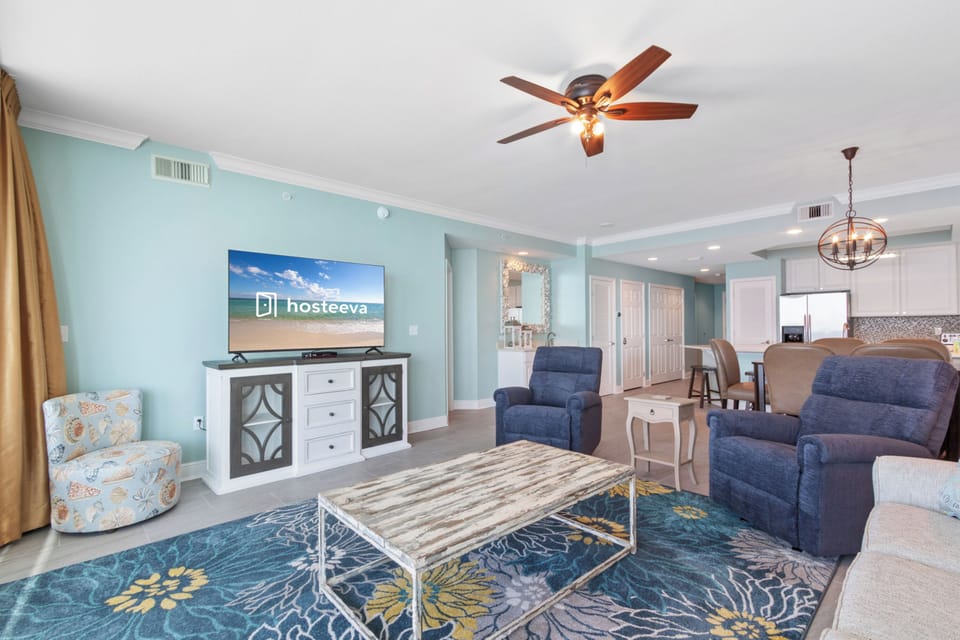 Signature Condo, 3 Bedrooms, Balcony, Beach View | Living room | 50-inch Smart TV with cable channels