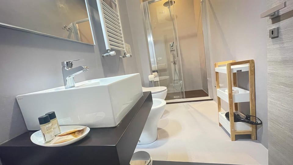 Panoramic Double Room, Balcony | Bathroom | Shower, hair dryer, towels, soap