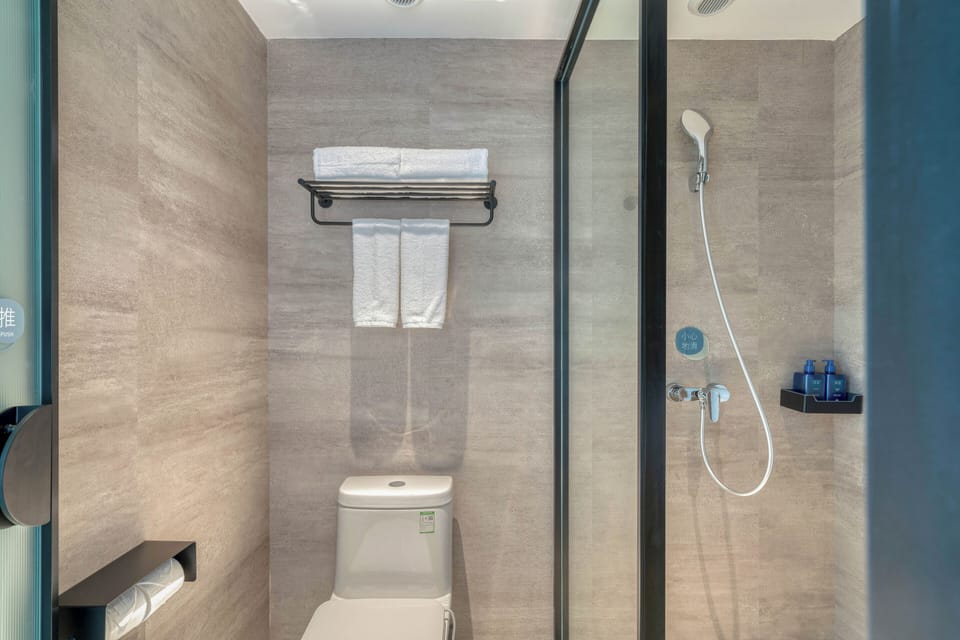 Hair dryer, slippers, towels, soap