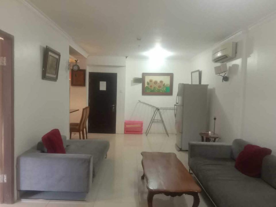 Family Apartment, 1 Bedroom, Balcony, Pool View | Living area | 40-inch LCD TV with digital channels