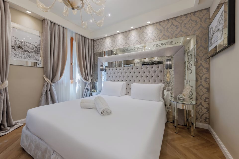 Superior Room | Minibar (free items), in-room safe, desk, laptop workspace