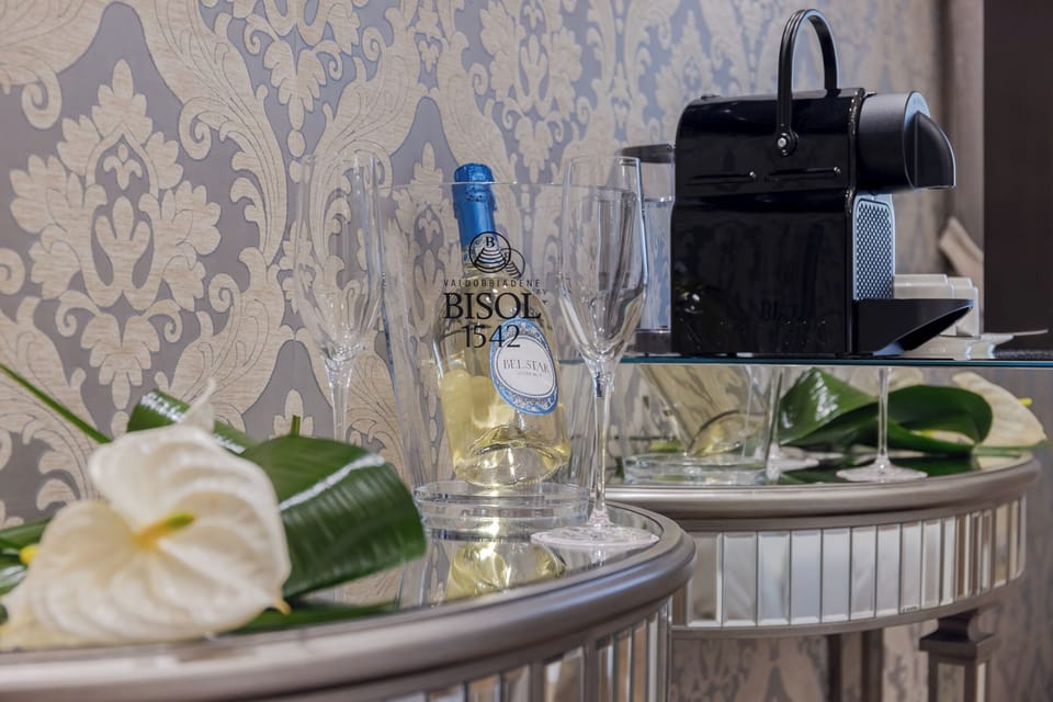 Superior Room | Minibar (free items), in-room safe, desk, laptop workspace
