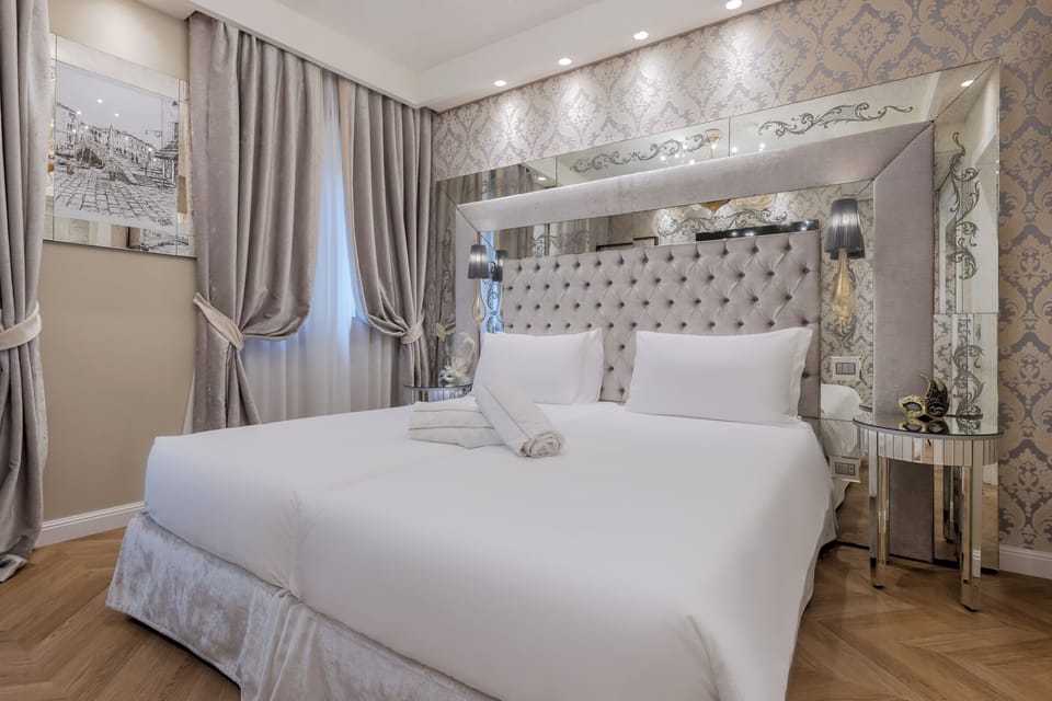 Superior Room | Minibar (free items), in-room safe, desk, laptop workspace