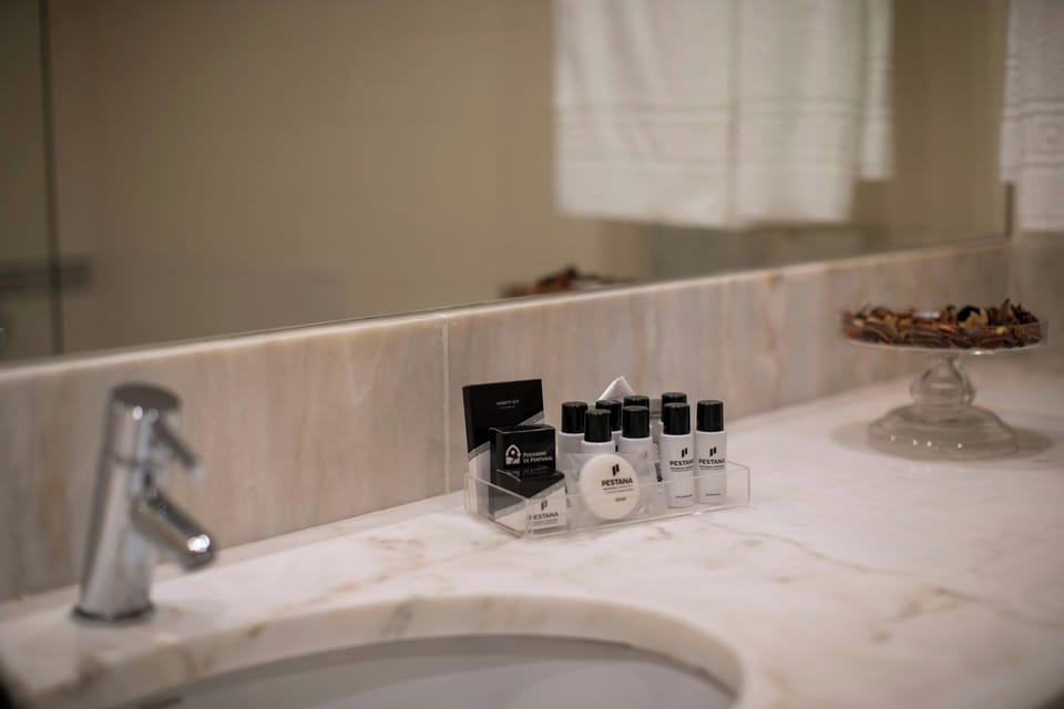Eco-friendly toiletries, hair dryer, bidet, towels