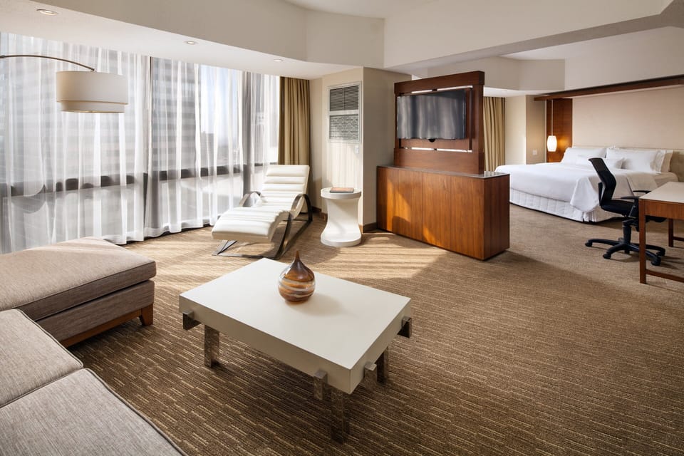 Premium bedding, down comforters, pillowtop beds, in-room safe