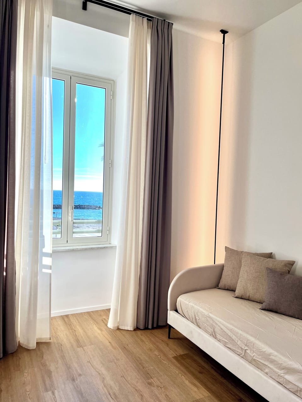 Deluxe Triple Room, Sea View | Desk, laptop workspace, free WiFi