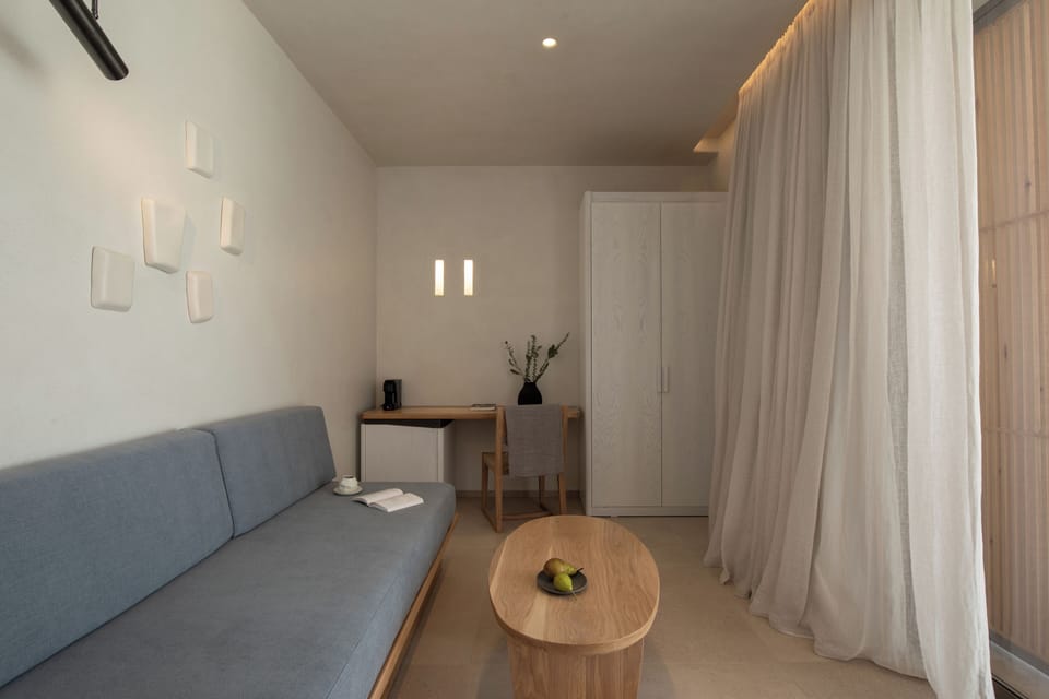 Private Executive Suite | Living area | 50-inch LED TV with satellite channels