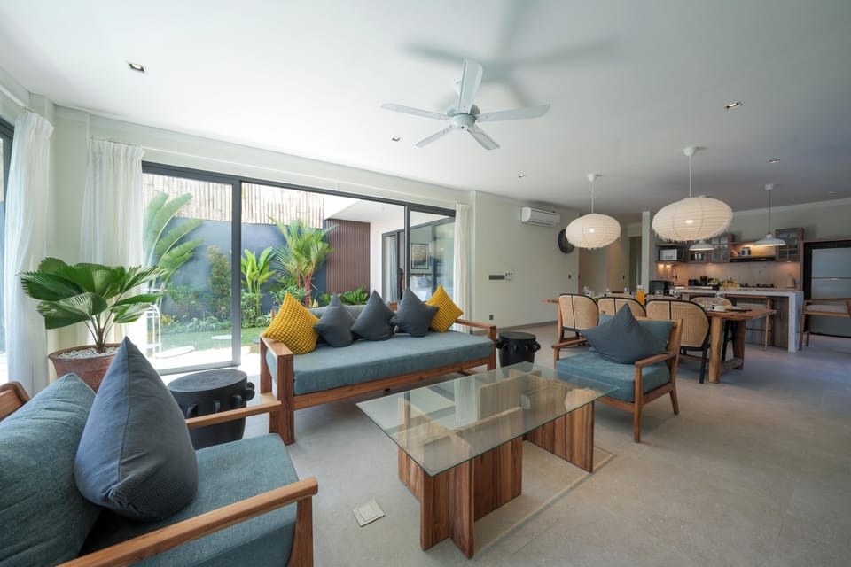 Deluxe Villa, Balcony, Pool View | Living area | 50-inch Smart TV with digital channels, Netflix, streaming services