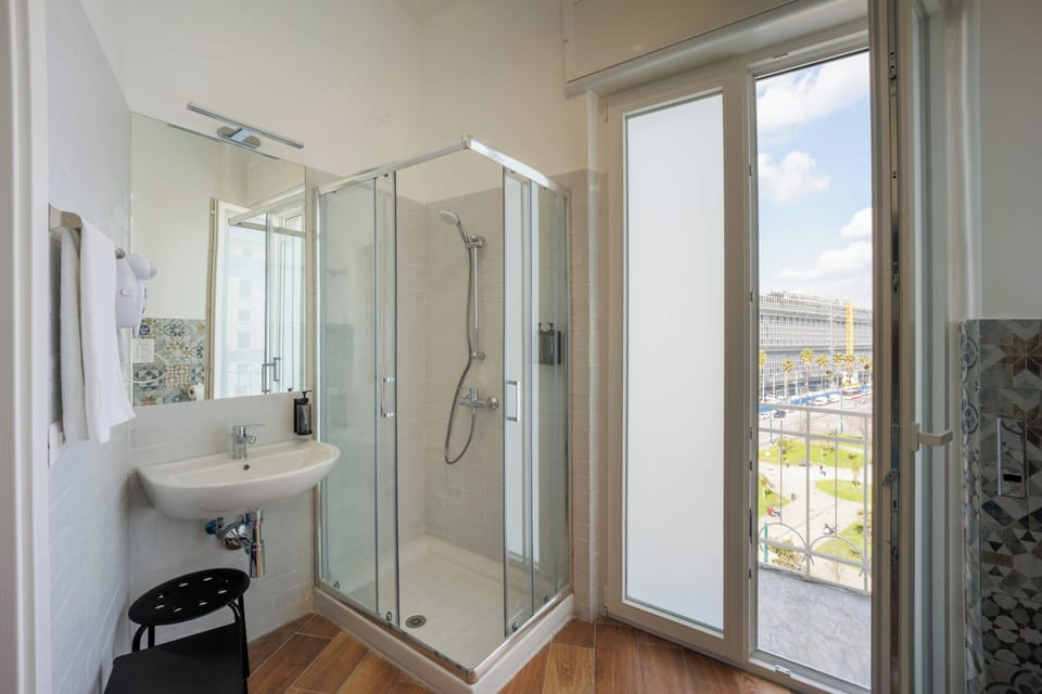 Deluxe Double Room, Balcony, City View | Bathroom | Hair dryer, bidet, towels, soap