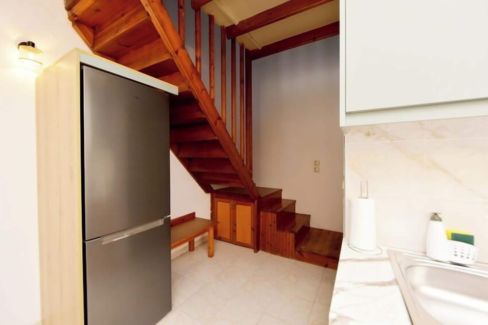 Family Quadruple Room | Private kitchen | Fridge, microwave, stovetop, highchair