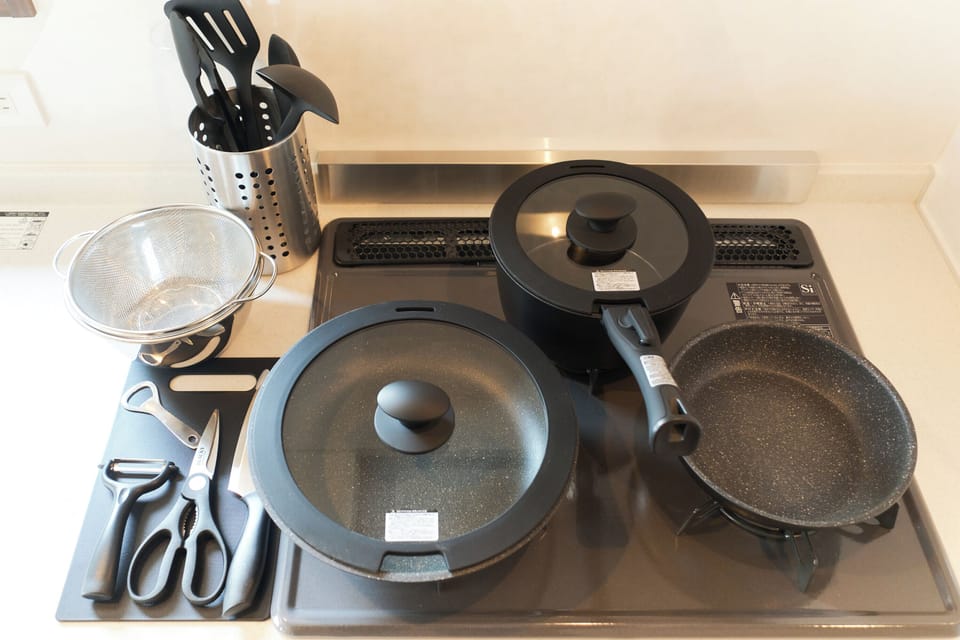 Apartment | Private kitchen | Fridge, microwave, stovetop, cookware/dishes/utensils