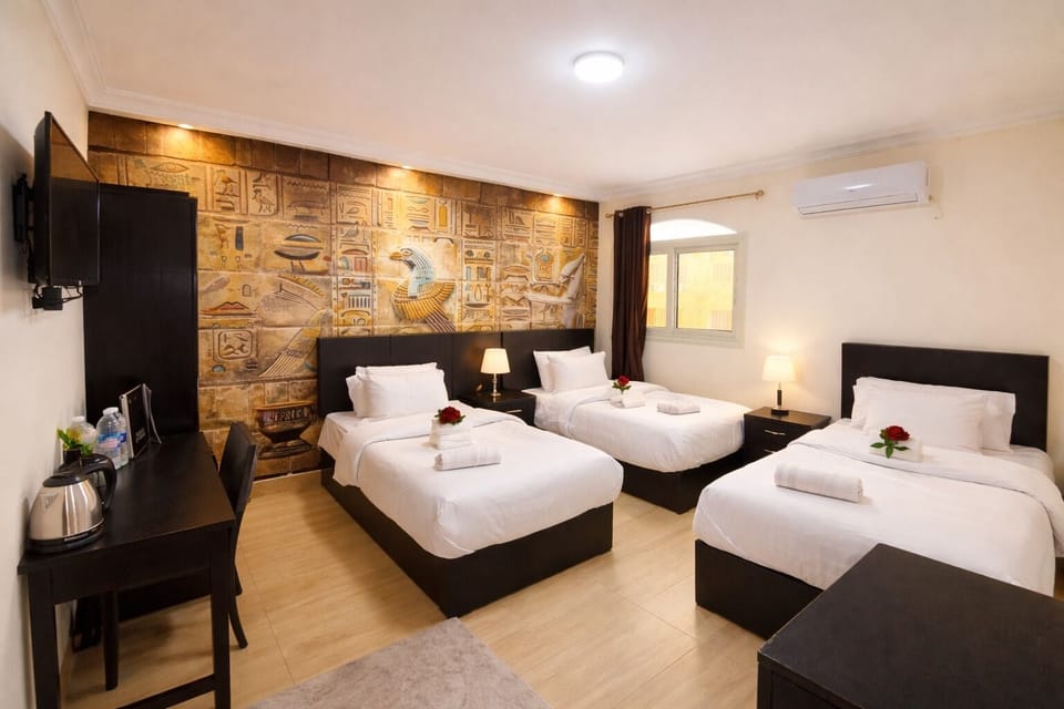Triple Room, City View | Premium bedding, down comforters, memory foam beds, minibar