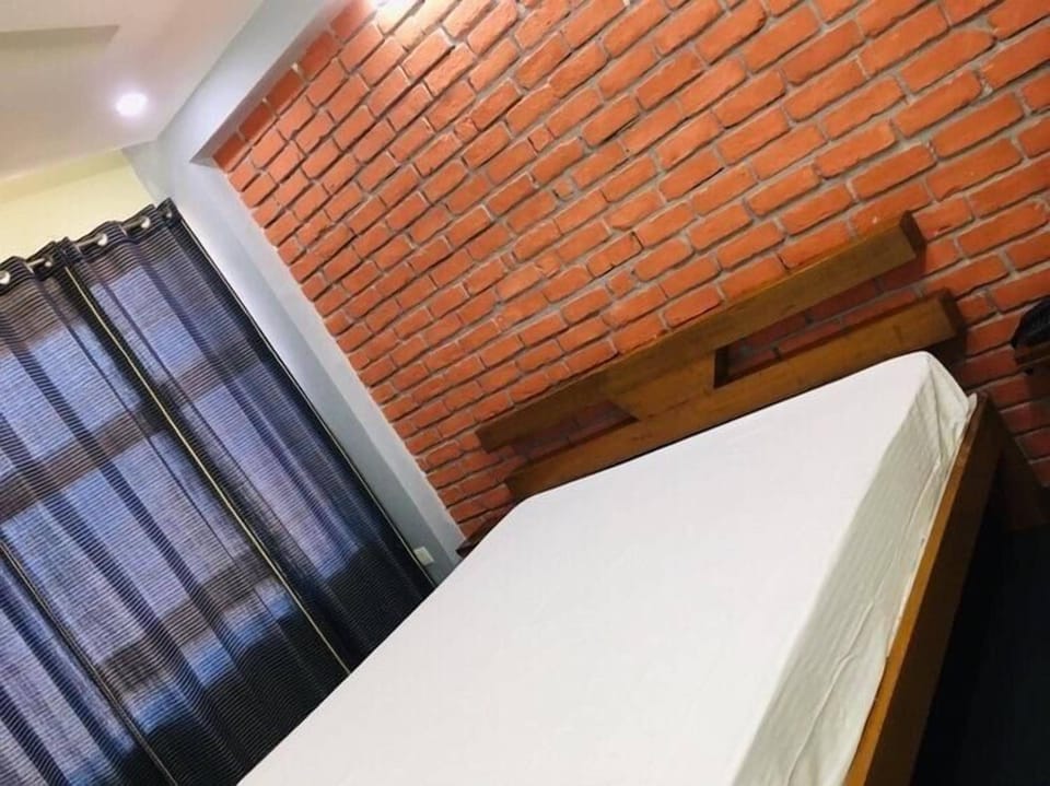 Deluxe Single Room, Hill View | In-room safe, desk, laptop workspace, soundproofing