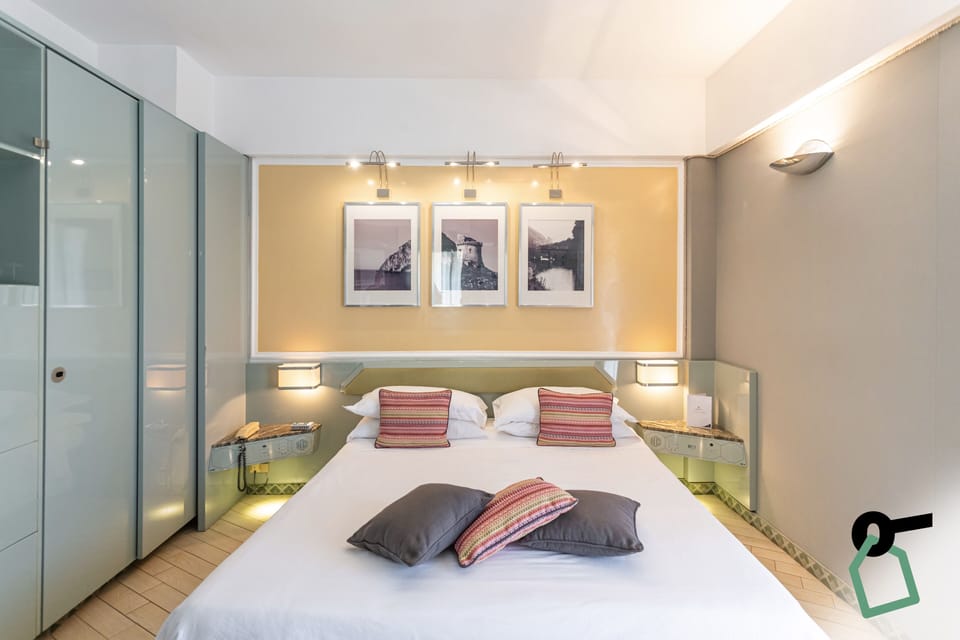 Triple Room, Balcony | Minibar, in-room safe, desk, free WiFi