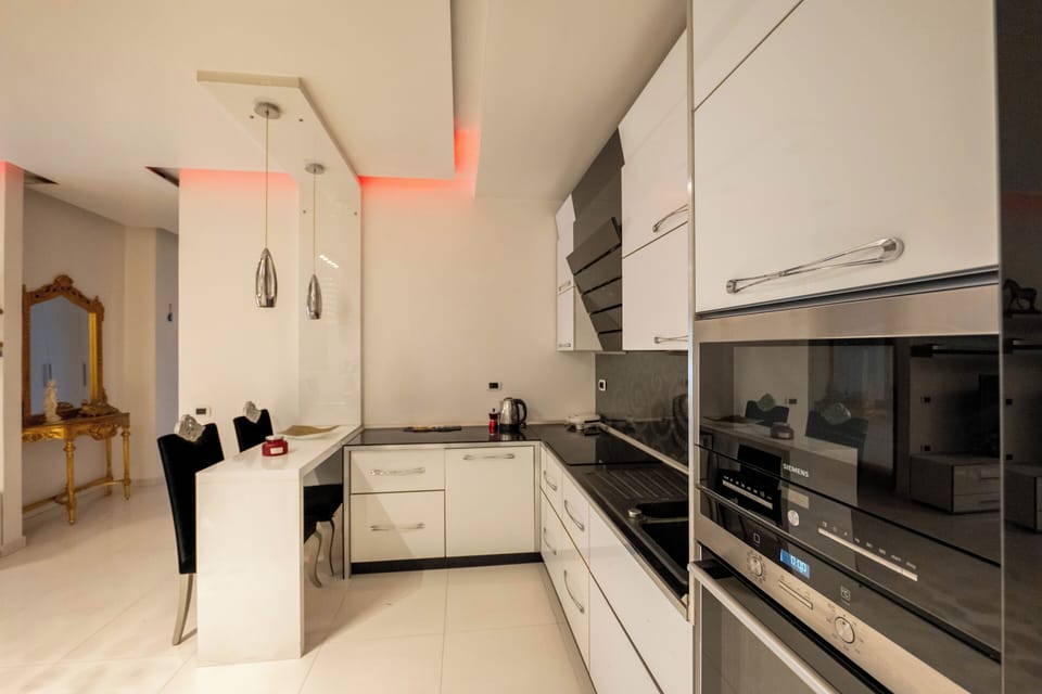 Apartment, 2 Bedrooms, Balcony | Private kitchen | Fridge, oven, stovetop, electric kettle